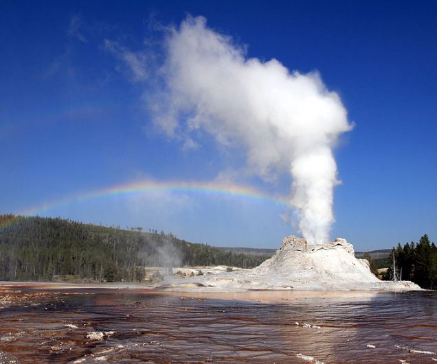 Double Rainbow stretching above the Castle Geyser, Yellowstone National Park