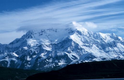 Mount St.Elias with its peak reaching the blue sky