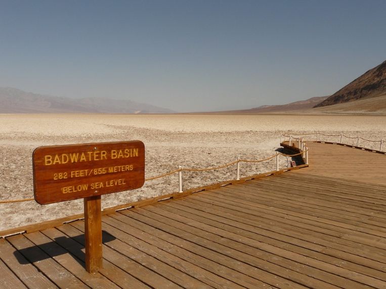 Wooden pathwalkand a signage to the Badwater basin