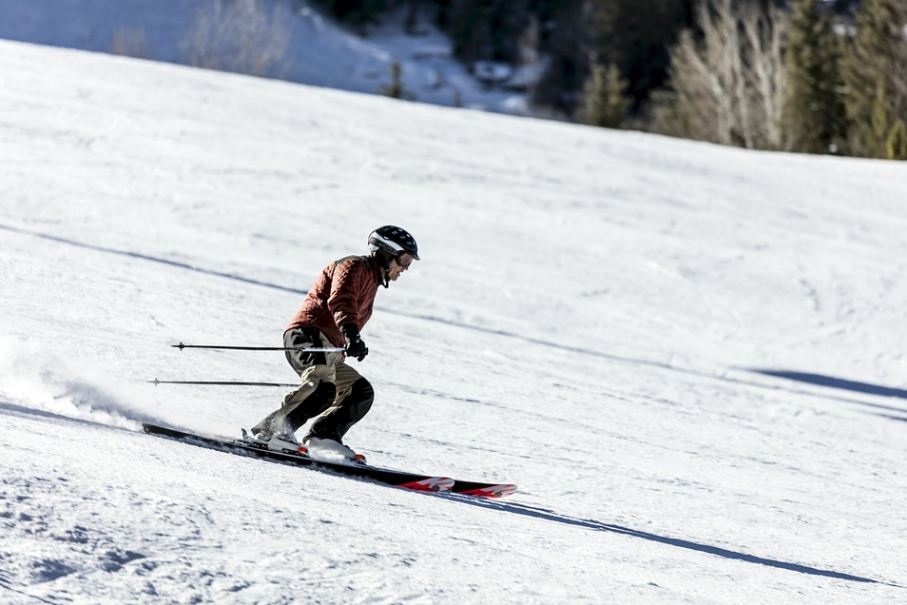 a skier heading downhill