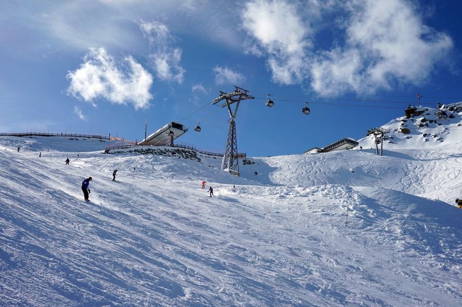skiers at Sölden, Austria ski resort, ski lift, cable car
