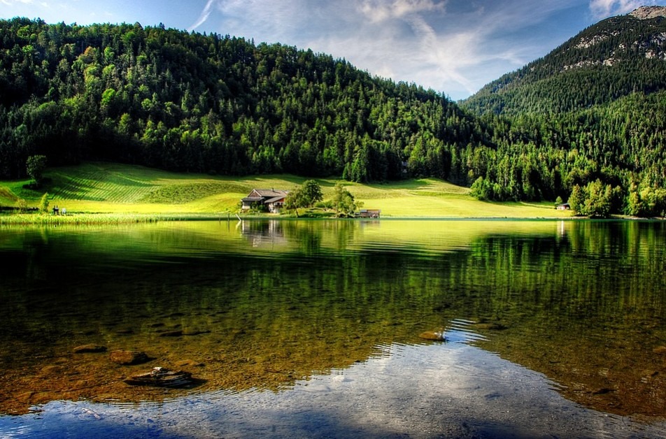 a crystal-clear lake on a summer in Tyrol