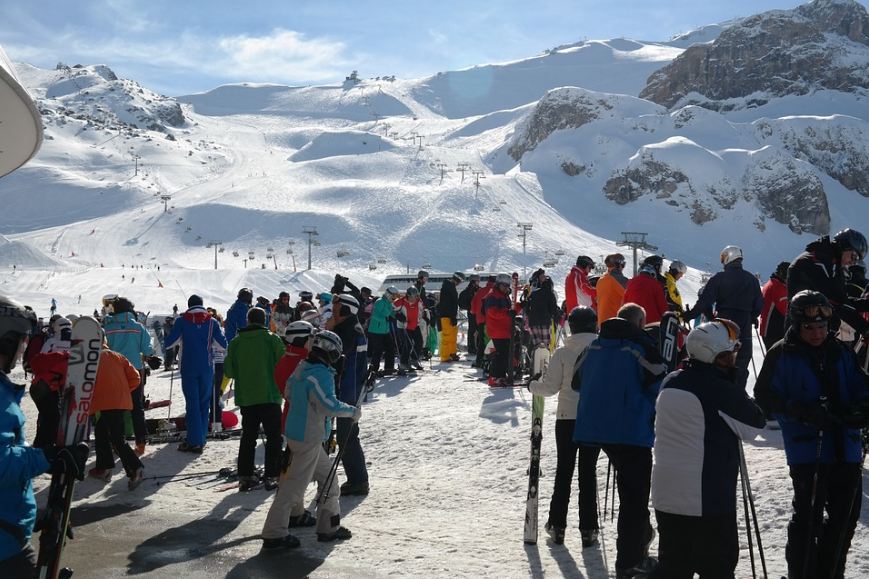 influx of skiers and snowboarders at the base of Ischgl ski area