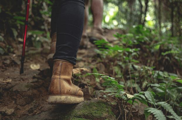 Boots of a woman on a hiking