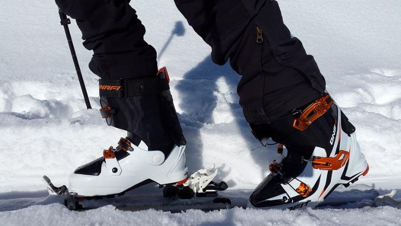 close up photo of a skier wearing ski boots